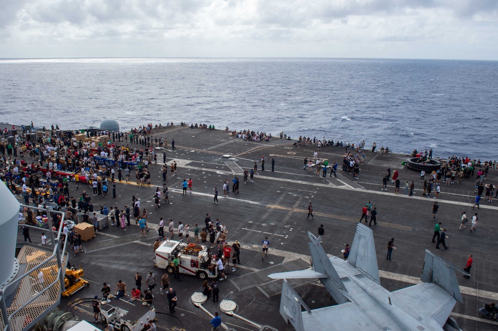 USS Ronald Reagan (CVN 76) holds a steel beach picnic for the 4th of July