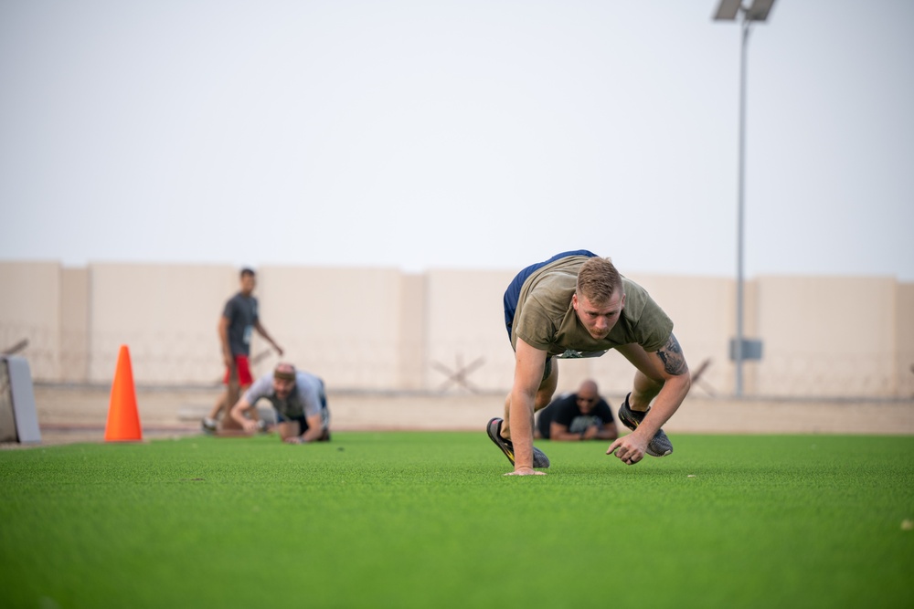 Airmen participate in spartan-like obstacle course