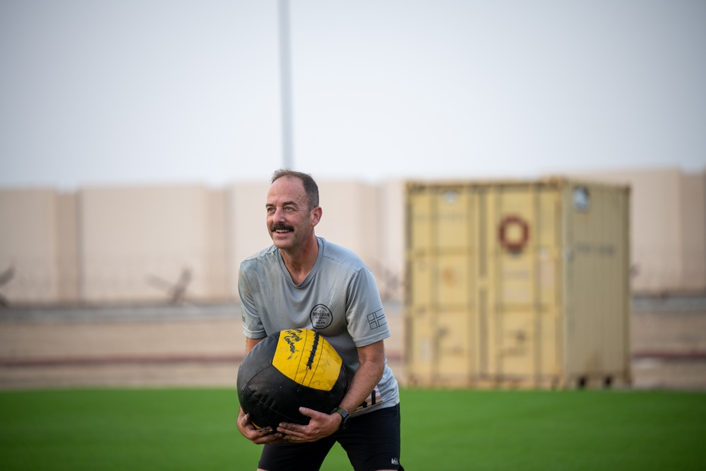 Airmen participate in spartan-like obstacle course