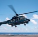 A Chilean Navy AS532 Cougar Eurocopter takes off from USS Carl Vinson (CVN 70)