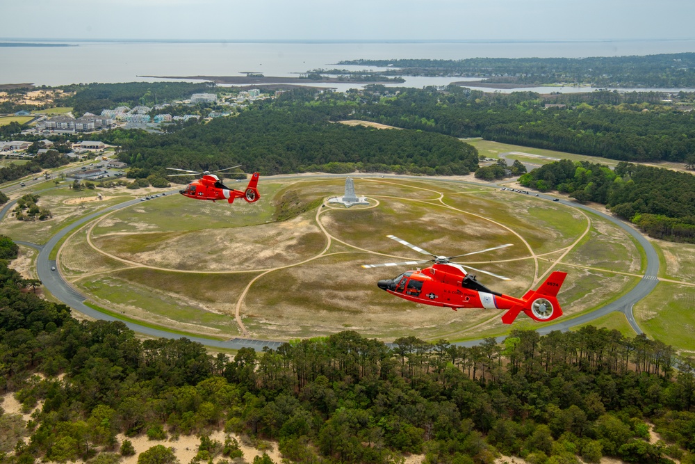 Historic Flight: MH-65 Delta's Final Journey Commemorated with Formation Flight Over Wright Brothers' Memorial