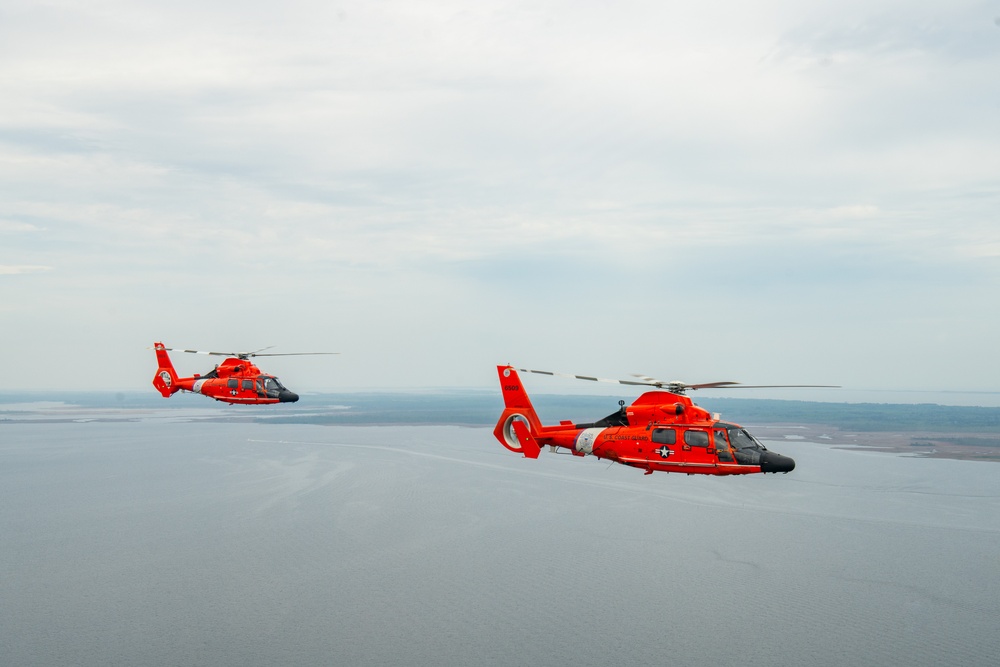 Historic Flight: MH-65 Delta's Final Journey Commemorated with Formation Flight Over Wright Brothers' Memorial