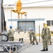 Naval Expeditionary Logistics Support Group and USS Chosin (CG 65) Guide a Missile Canister Using the U.S. Navy’s Transferrable Rearming Mechanism