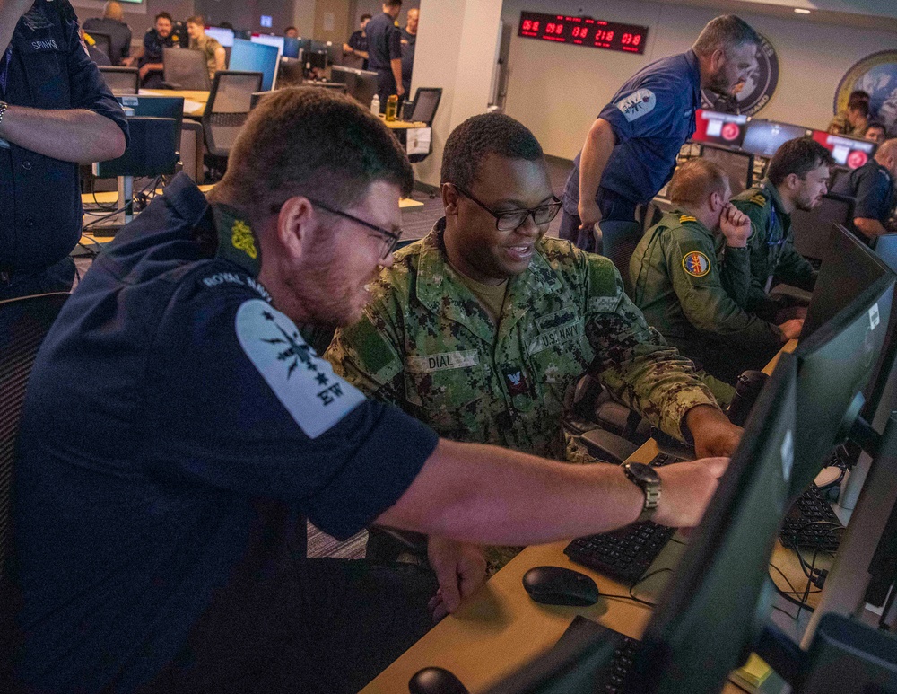 CSG-4 &amp; UK Strike Force Lead Joint, Allied Fleet Synthetic Training Event