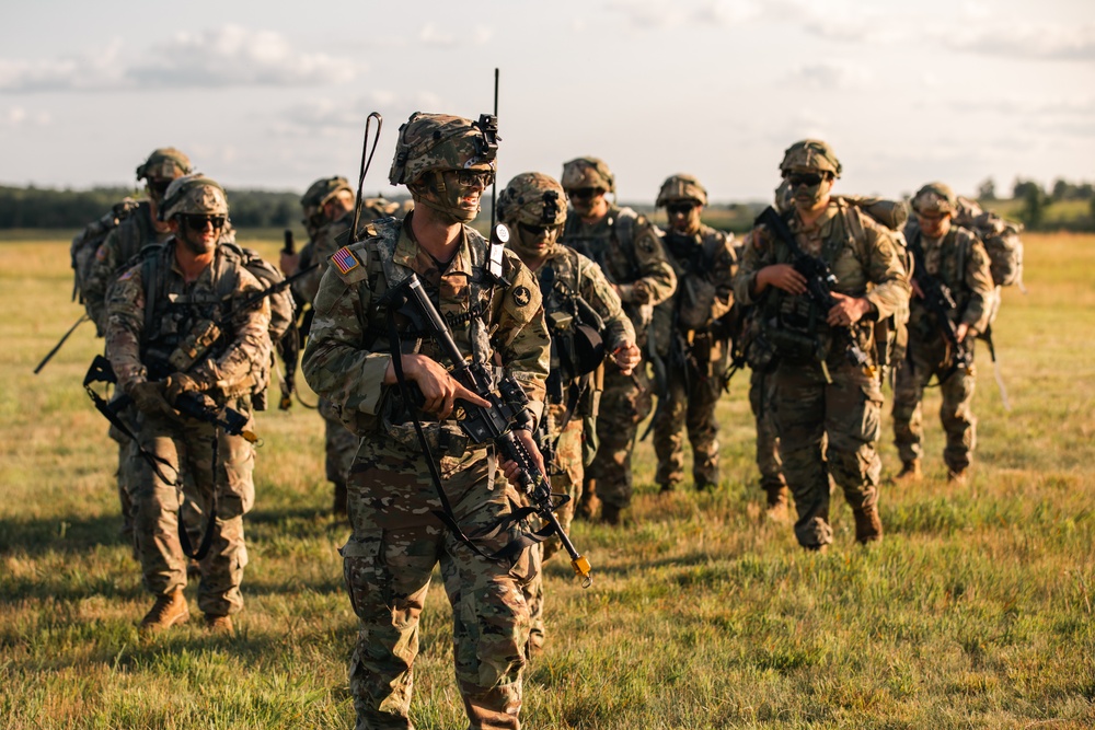 Iowa National Guard infantrymen move to rally point following air assault exercise