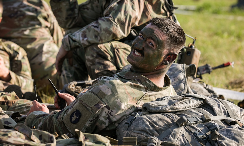 Iowa Soldier waits to board Black Hawk during air assault exercise