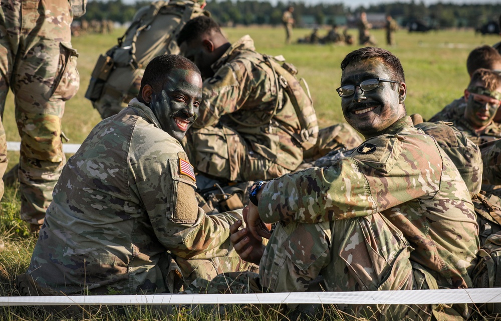 Iowa Soldiers wait to board Black Hawk during air assault exercise