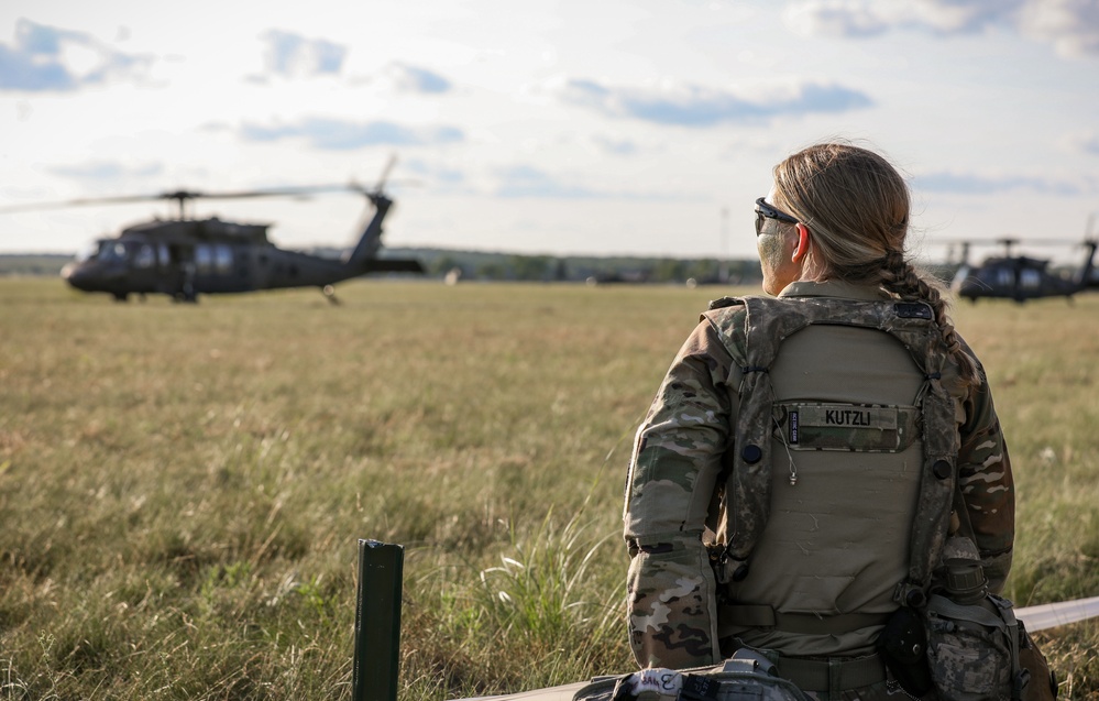 Iowa Soldier waits to board Black Hawk during air assault exercise