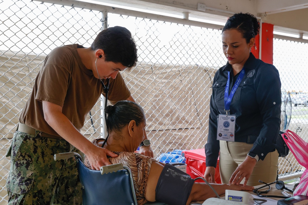 Continuing Promise 2024 treat patients in a temporary medical facility at the port of Limón, Costa Rica