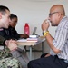 Continuing Promise 2024 treat patients in a temporary medical facility at the port of Limón, Costa Rica