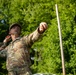 Sgt. Trenton Tuberosa throws a practice grenade