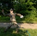 Lt. Col. Thomas Sebastiani throws a practice grenade