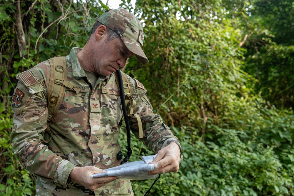 Col. Brent Dishman checks his map