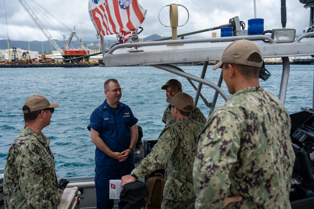 Coast Guard 14th District Commander greets members of Port Security Unit 311 at RIMPAC 2024