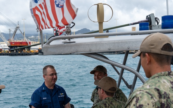 Coast Guard 14th District Commander greets members of Port Security Unit 311 at RIMPAC 2024
