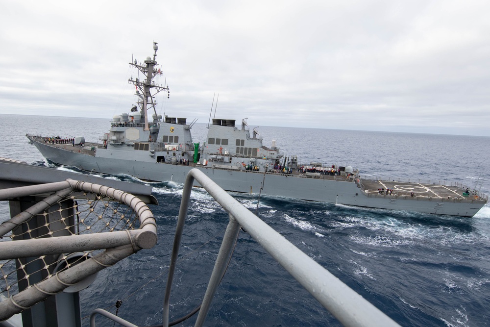 Abraham Lincoln conducts a fueling-at-sea with USS O'Kane