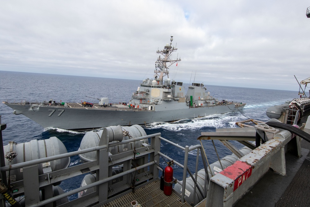 Abraham Lincoln conducts a fueling-at-sea with USS O'Kane