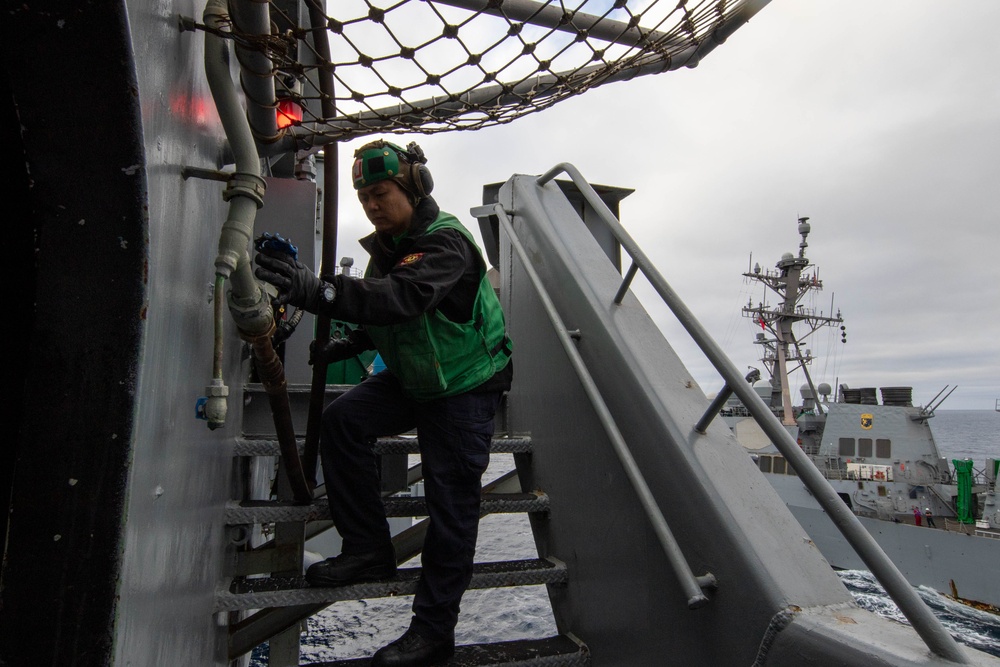 Abraham Lincoln conducts a fueling-at-sea with USS O'Kane