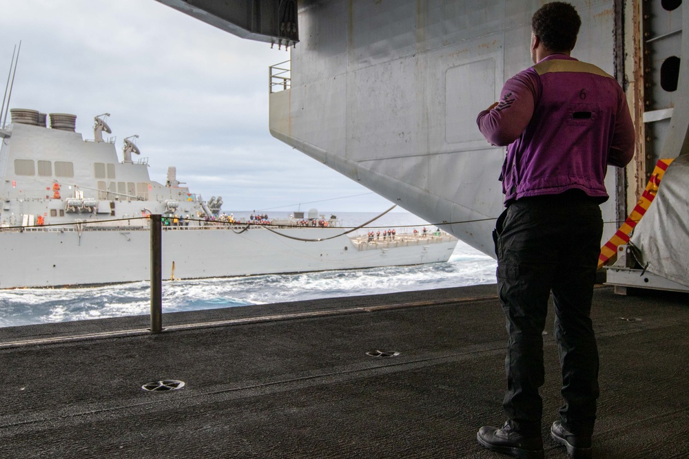 Abraham Lincoln conducts a fueling-at-sea with USS O'Kane