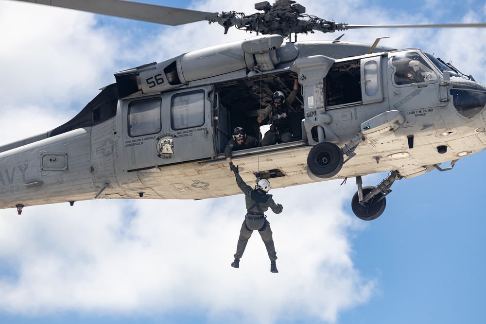 Naval helicopter squadrons practice live hoisting during RIMPAC 2024