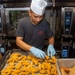 USS Ronald Reagan (CVN 76) Sailors prepare food