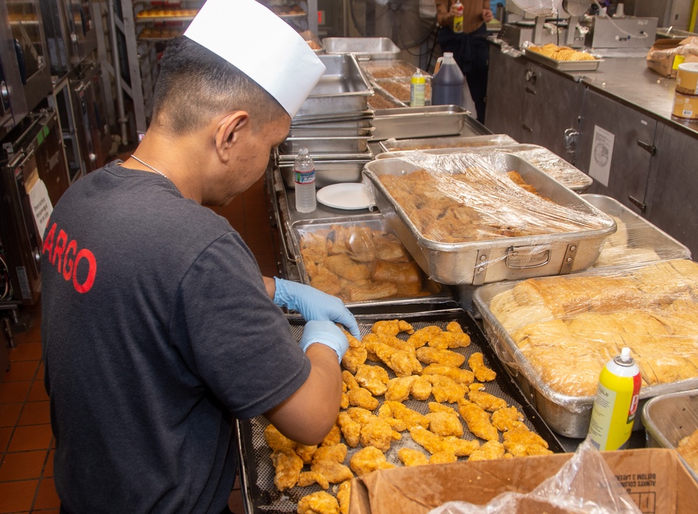 USS Ronald Reagan (CVN 76) Sailors prepare food