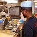 USS Ronald Reagan (CVN 76) Sailors prepare food