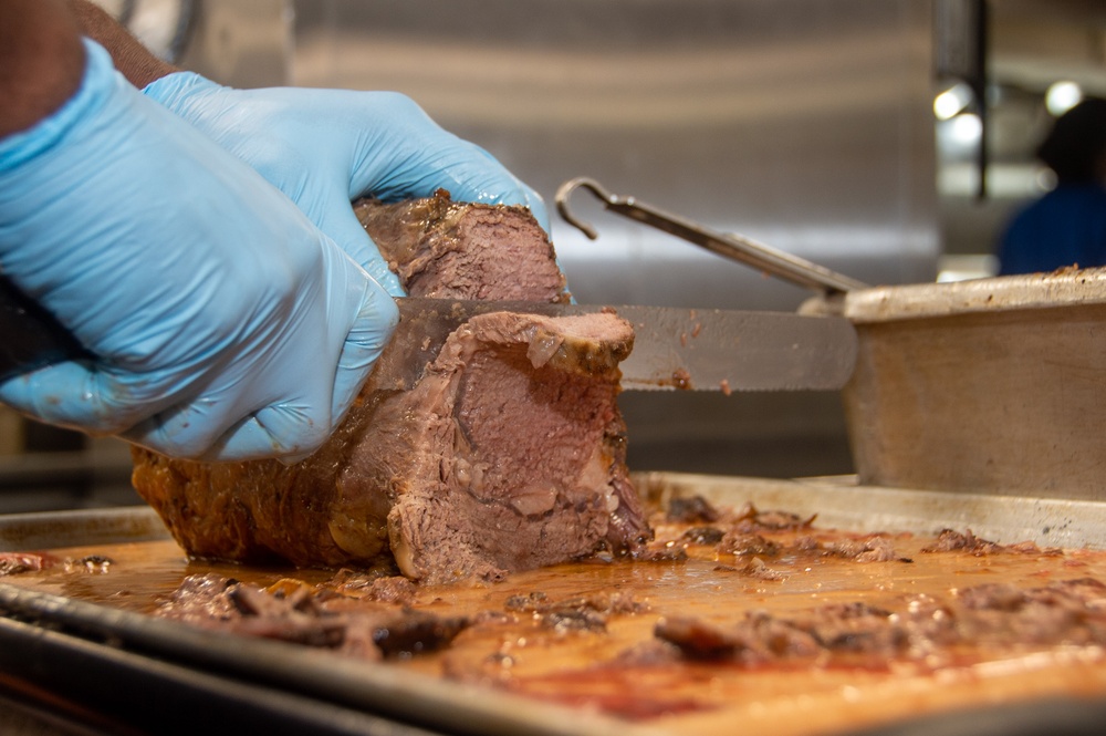 USS Ronald Reagan (CVN 76) Sailors prepare food