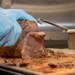 USS Ronald Reagan (CVN 76) Sailors prepare food