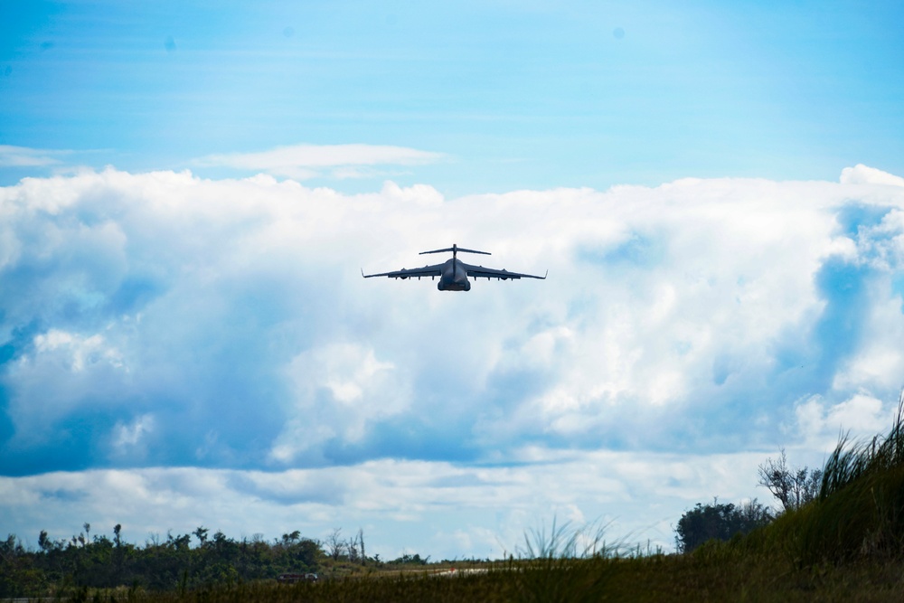 146CRT Airmen offload C-17 cargo, set up for command and control of Northwest Field, Guam