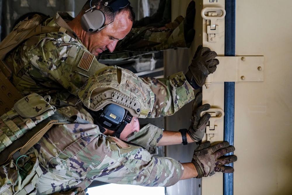 146CRT Airmen offload C-17 cargo, set up for command and control of Northwest Field, Guam