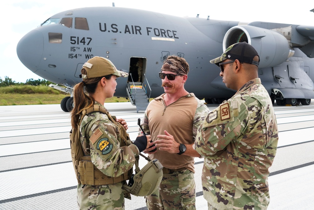 146CRT Airmen offload C-17 cargo, set up for command and control of Northwest Field, Guam