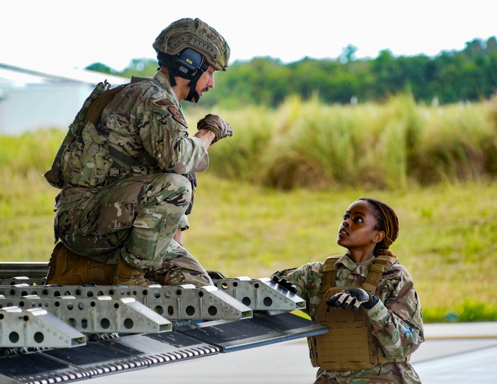 146CRT Airmen offload C-17 cargo, set up for command and control of Northwest Field, Guam