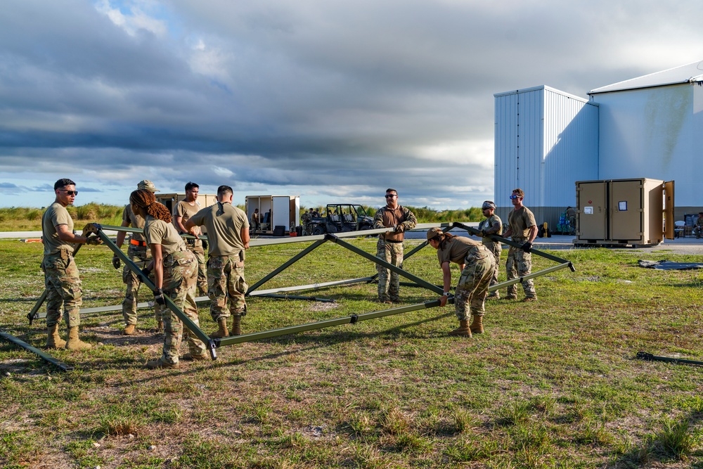 146CRT Airmen offload C-17 cargo, set up for command and control of Northwest Field, Guam