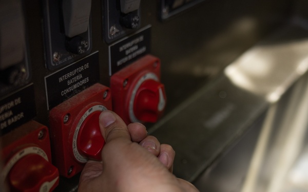 U.S. Marines with Littoral Craft Company Charlie learn about Colombian Marine Corps littoral crafts