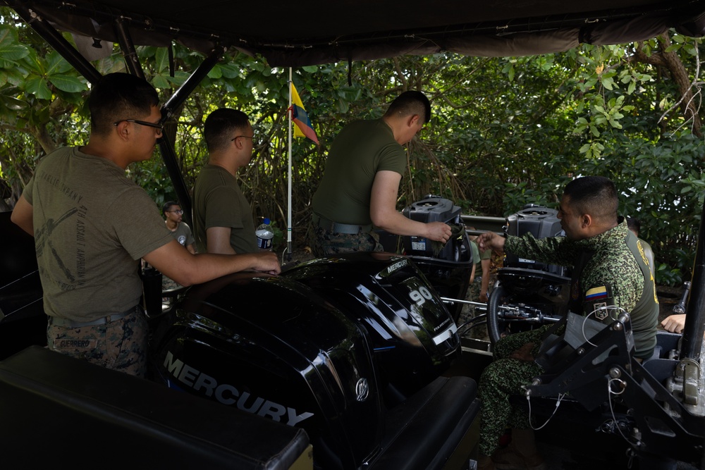 U.S. Marines with Littoral Craft Company Charlie learn about Colombian Marine Corps littoral crafts