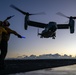 Aviation Boatswain’s Mate (Handling) signals to MV-22B Osprey