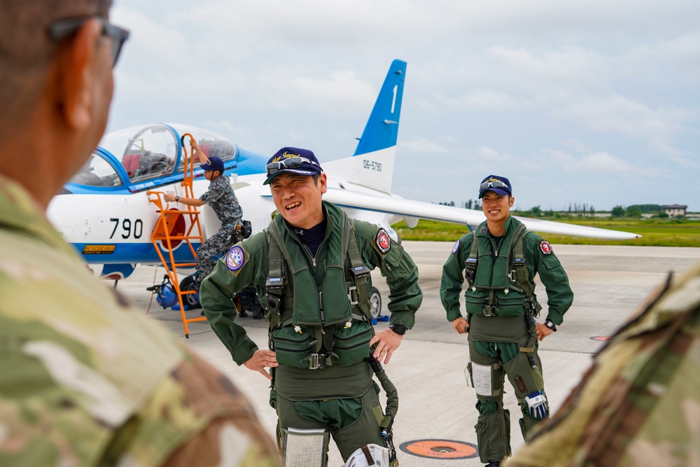 U.S. Service Members invited to watch Blue Impulse while at Matsushima AB for Valiant Shield