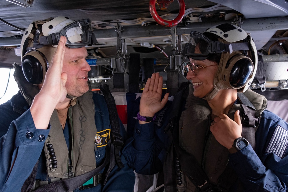 Oxnard native reenlists aboard Navy helicopter