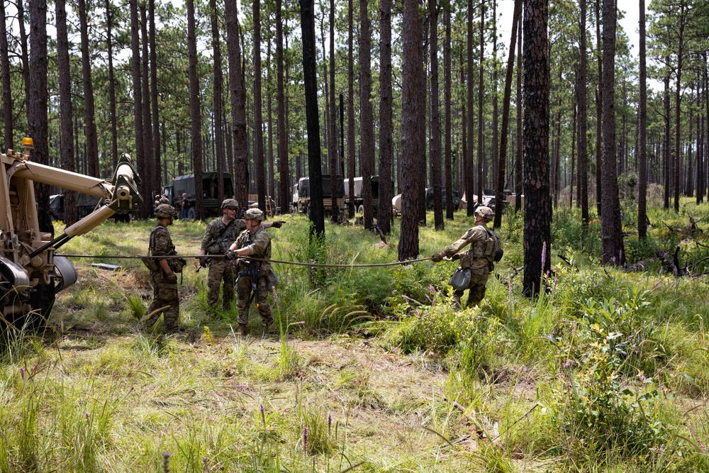 Recovery team pulls winch line