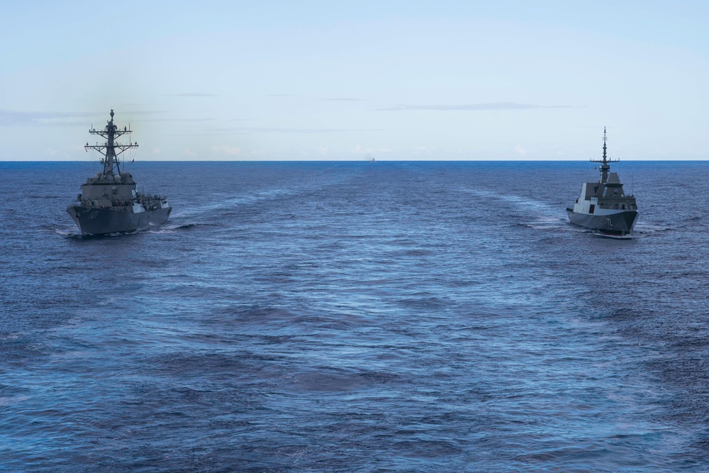 United States Ship (USS) Gridley (101) (left) &amp; Royal Singaporean Ship (RSS) Stalwart (72)(right) approach Naval Replenishment Unit (NRU) Asterix for a replenishment at sea.