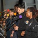 USS Ronald Reagan (CVN 76) Sailors hold a baptism in the Hangar Bay.