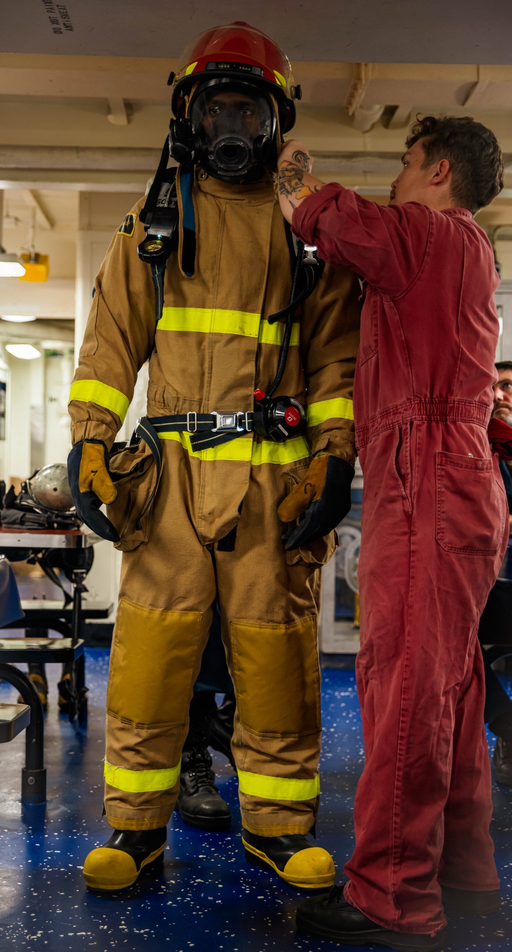 Sailors Conduct Firefighting Equipment Class Aboard USS Harpers Ferry