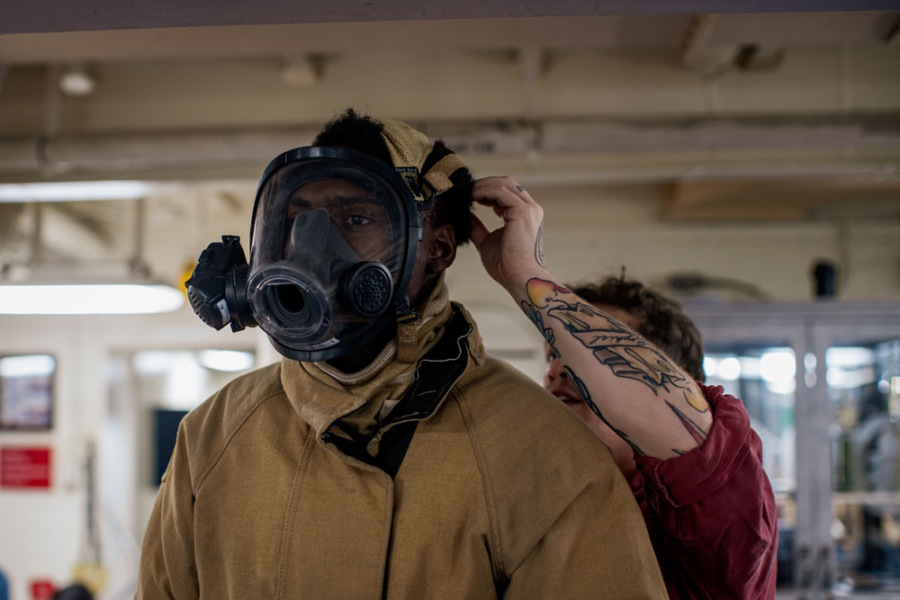 Sailors Conduct Firefighting Equipment Class Aboard USS Harpers Ferry