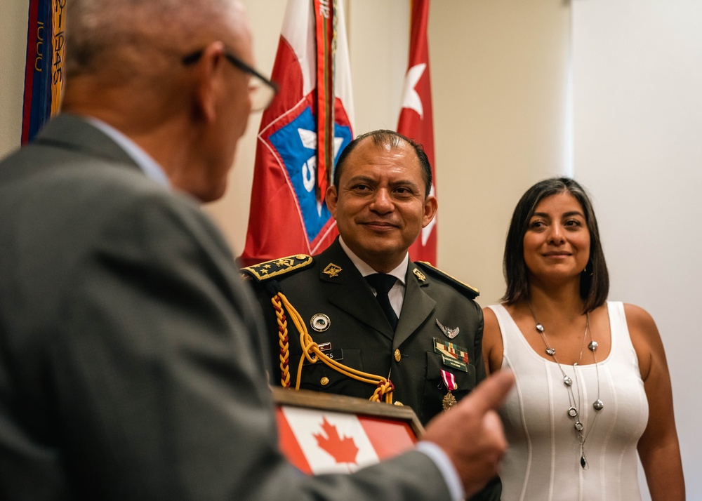 Army North Commanding General presents Mexican liason with the Meritorious Service Medal