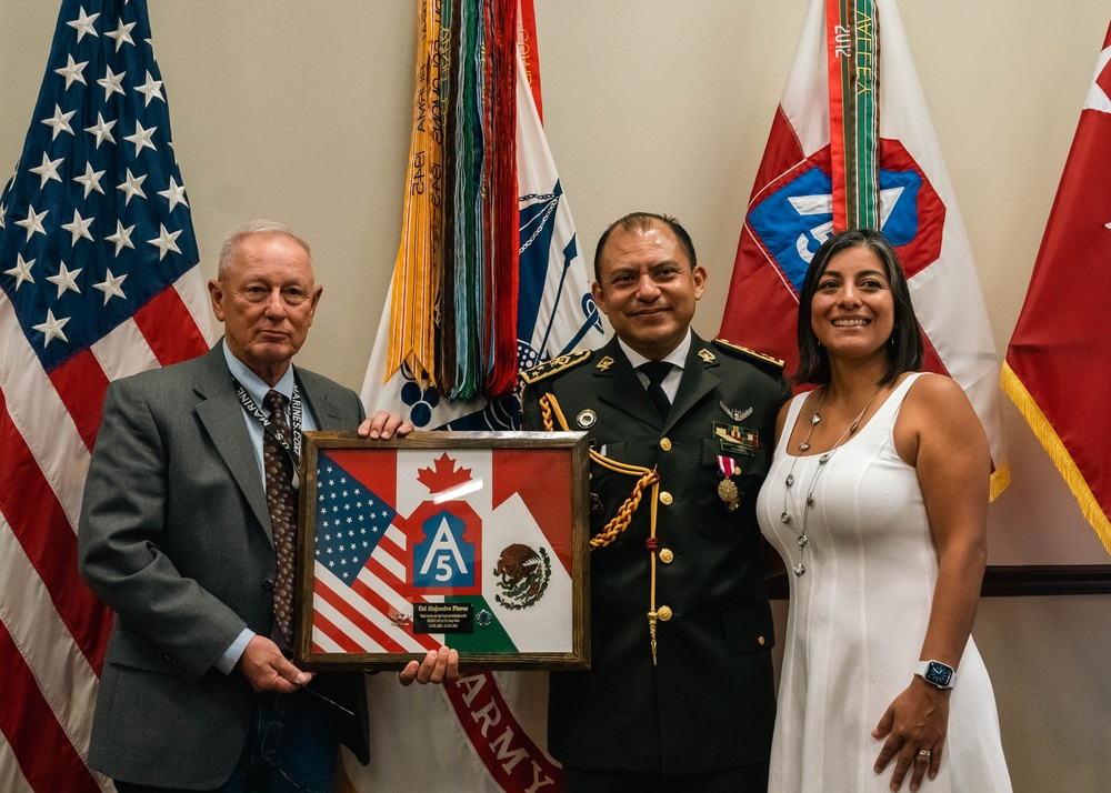 Army North Commanding General presents Mexican liason with the Meritorious Service Medal