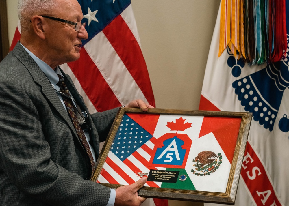 Army North Commanding General presents Mexican liason with the Meritorious Service Medal