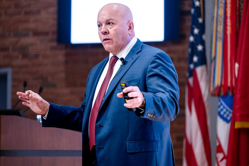Photo By Billie Suttles | Department of Justice Assistant Director Doug Mickle delivers a lecture on Bid Protests during the 176th Contract Attorneys Course at The Judge Advocate General's Legal Center and School. 