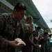 U.S. Marines with Littoral Craft Company Charlie, eat jackfruit with their Colombian Marine Corps Instructor