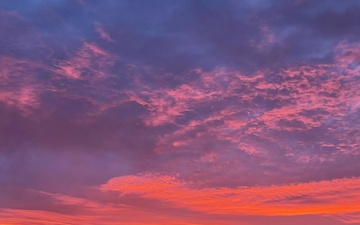 Purple and orange sunrise at Cheboygan River Crib Light